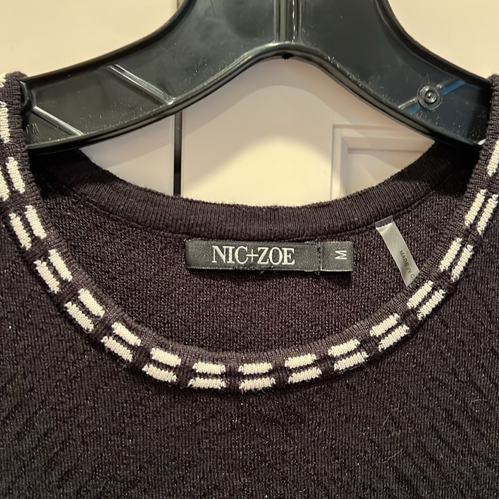 Nick and Zoe size medium black sleeveless sweater with cream accents, arms &neck